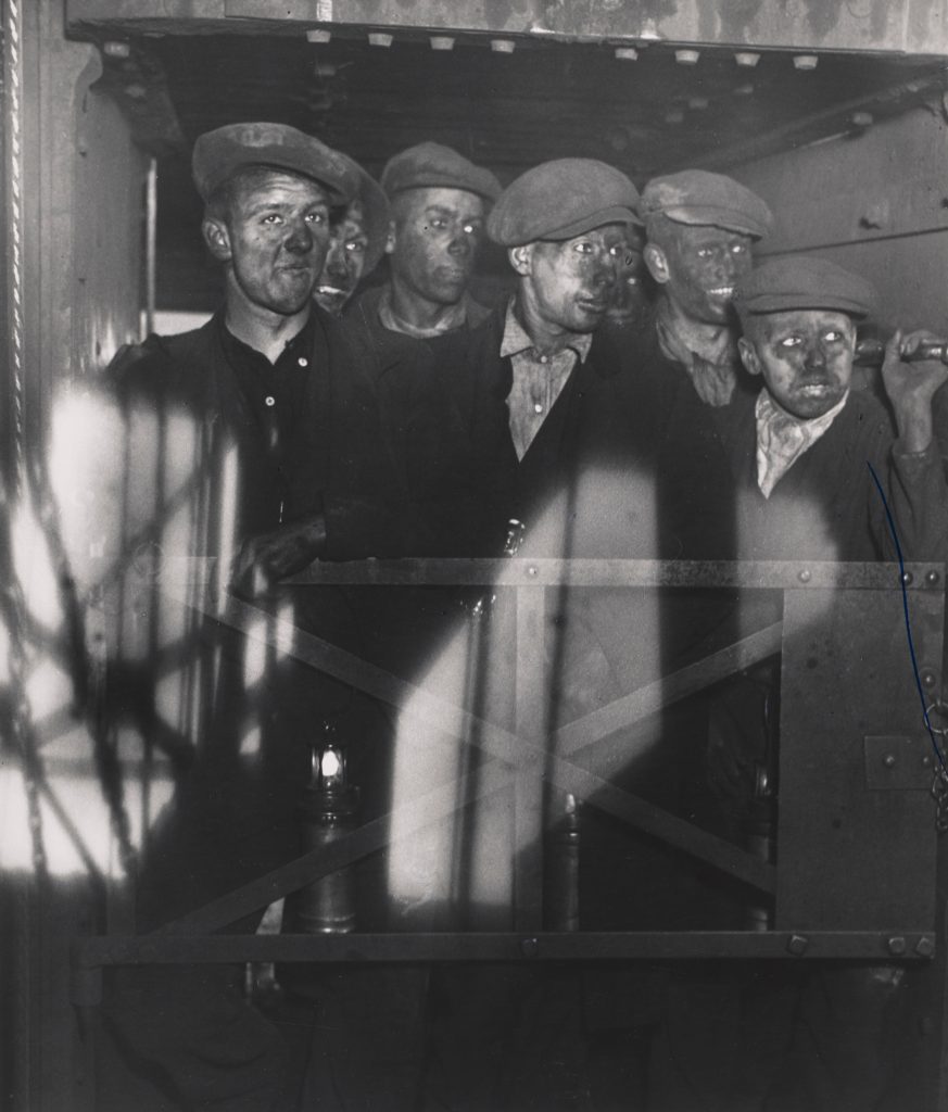 Bill Brandt, Miners returning to daylight, c.1936. © Bill Brandt / Bill Brandt Archive Ltd Black and white photograph of miners