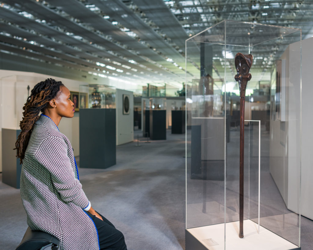 Msezane engaged with the Sainsbury Centre collection while in isolation. Photo: Andy Crouch Photograph of South African artist Sethembile Msezane with an object from the Sainsbury Centre's collection
