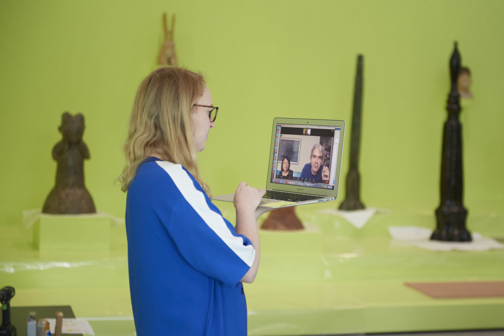 Tania installing Leiko exhibition Photograph of Sainsbury Centre chief curator Tania Moore on a Zoom call with artist Leiko Ikemura and Ikemura's partner and frequent collaborator Philipp von Matt