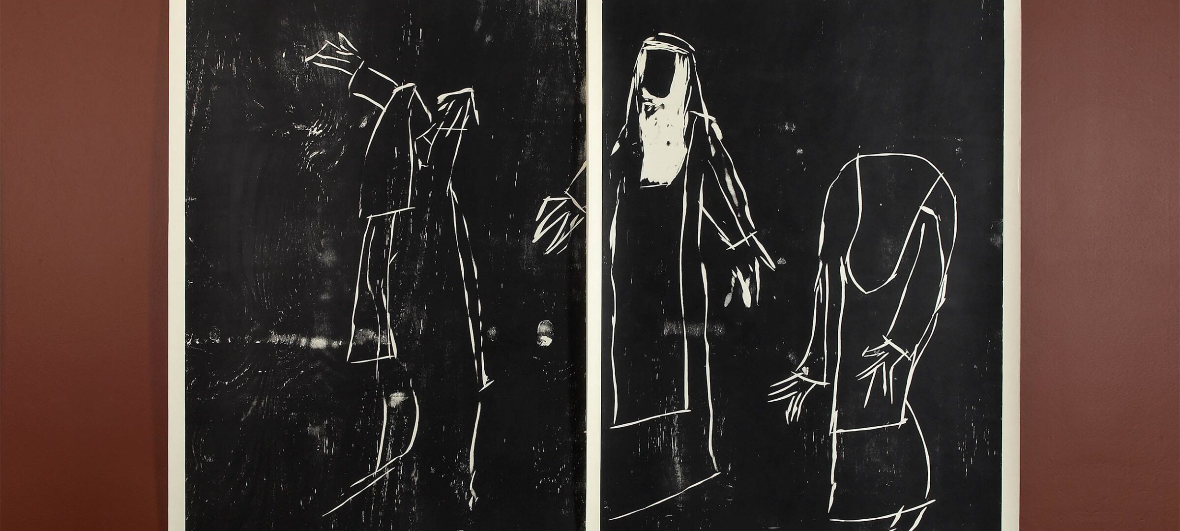 Black and white mono print on paper in two parts of three nuns dancing, mounted on a dark brown background