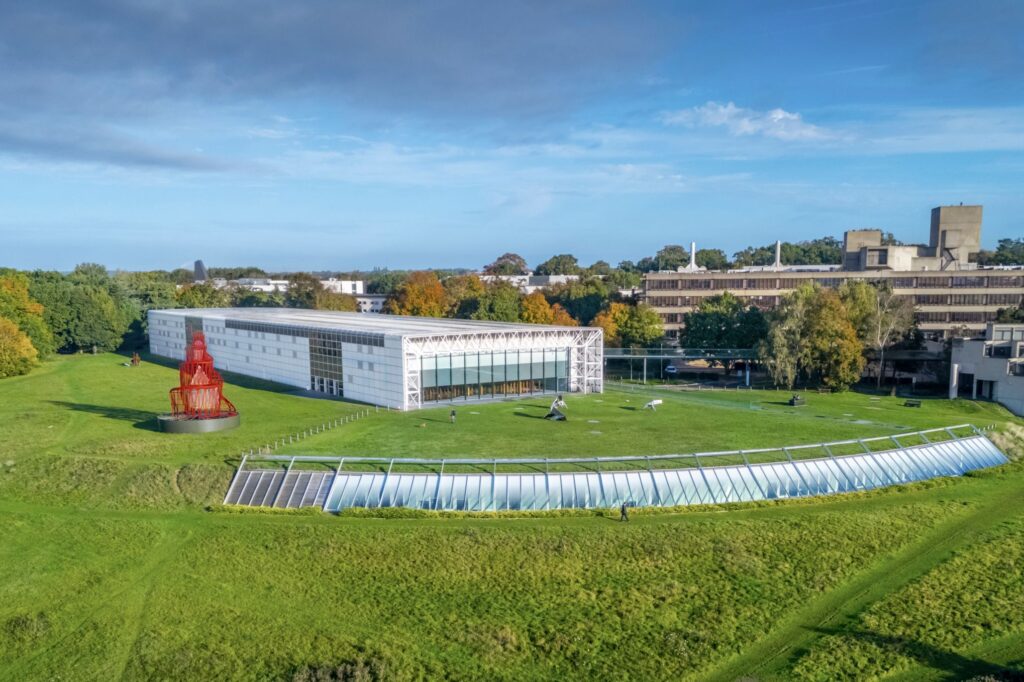 Exterior view of the Sainsbury Centre Drone photo image from above of the Sainsbury Centre building in Norwich, a large art museum